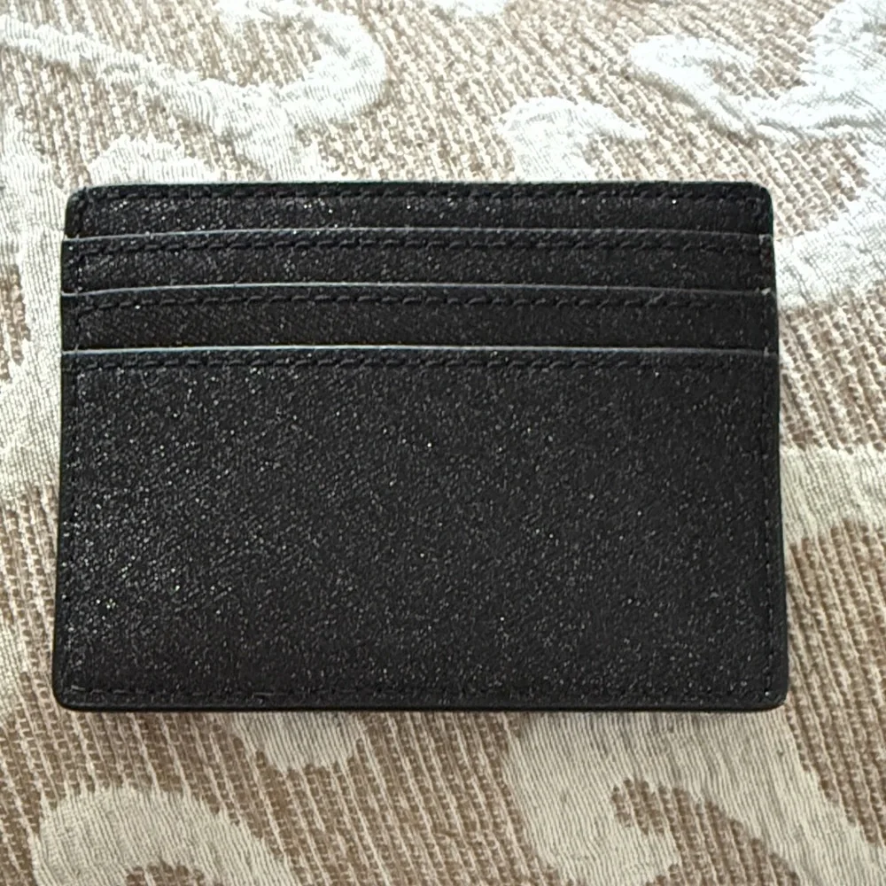 kate spade black and gold Saffiano card case